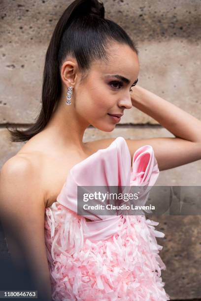 Sofia Carson, wearing a pink decorated dress, is seen outside the Giambattista Valli show during Paris Fashion Week - Womenswear Spring Summer 2020...