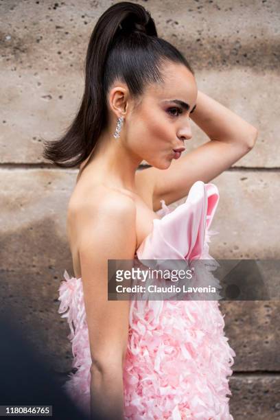 Sofia Carson, wearing a pink decorated dress, is seen outside the Giambattista Valli show during Paris Fashion Week - Womenswear Spring Summer 2020...