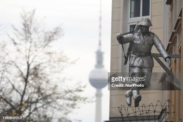 Statue to Hans Konrad Schumann, an East German border guard who defected to West Germany during the construction of the Berlin Wall in 1961, see on...