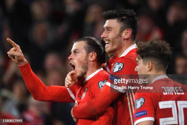Gareth Bale of Wales celebrates scoring his team's first goal during the UEFA Euro 2020 Qualifier between Wales and Croatia at the Cardiff City...