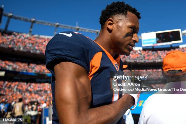Courtland Sutton of the Denver Broncos pounds his chest before the first quarter against the Tennessee Titans on Sunday, October 13, 2019.