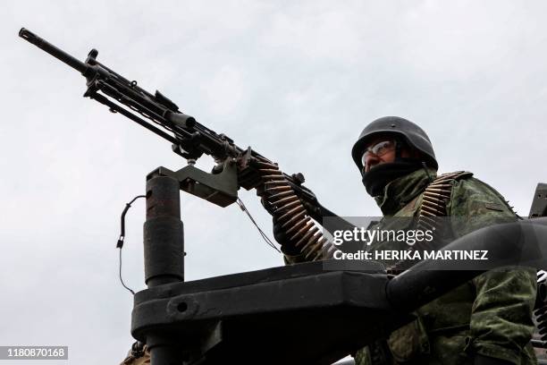 Member of the National Guard patrols the Sonora mountain range, where nine members of the LeBaron community were killed on Monday in the municipality...