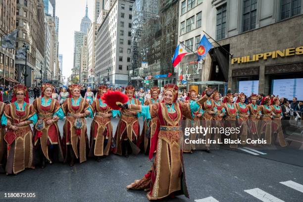 Dancers march down 5th Avenue with in traditional Spanish costumes during the 55th Hispanic Day Parade. The parade walked down 5th Avenue in the...