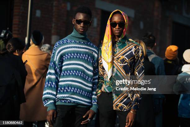 Senegalese models Tamsir Thiam and Cheikh Kebe after the Gucci show on Day 1 Milan Fashion Week Autumn/Winter 2019/20 on February 20, 2019 in Milan,...