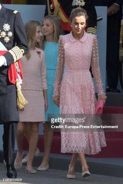 Queen Letizia of Spain, Princess Leonor and Princess Sofia attend the National Day Military Parade on October 12, 2019 in Madrid, Spain.