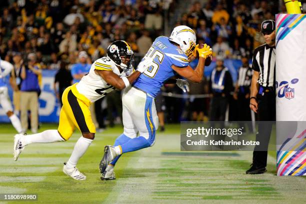 Tight end Hunter Henry of the Los Angeles Chargers makes the touchdown as cornerback Joe Haden of the Pittsburgh Steelers defends during the fourth...