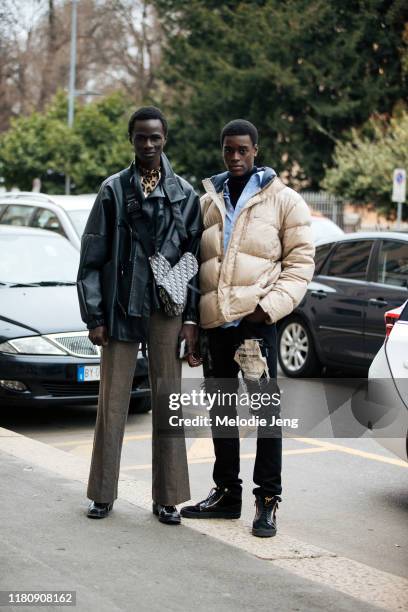 Models Malick Bodian and Babacar N'Doye after the Roberto Cavalli show on Day 4 Milan Fashion Week Autumn/Winter 2019/20 on February 23, 2019 in...