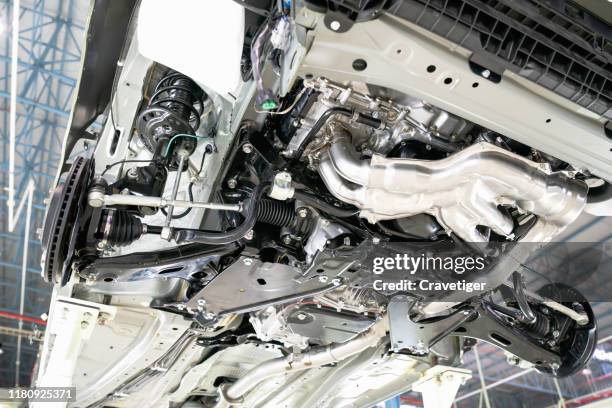 selective focus shot view on commercial  chassis under cabin different pneumatic, electric equipment and various parts details. car workshop. car under inspection maintenance repair on lift. - auto repair shop background stock pictures, royalty-free photos & images