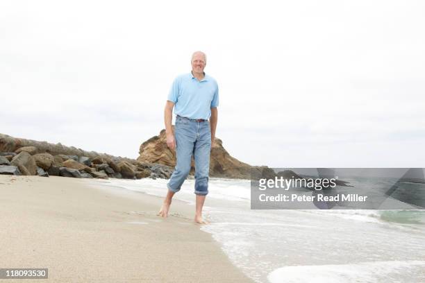 Where Are They Now: Portrait of 7-footer and former NBA player Mark Eaton on beach during photo shoot in Southern California. Eaton now travels the...