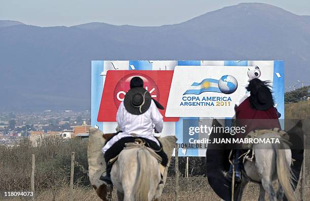 Gaucho --Southern Cone cowboy-- and his couple ride their horses to Salta city, some 1500 Km northwest of Buenos Aires, on July 3, 2011. Salta will...