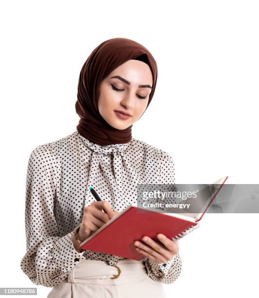 mujer joven musulmana - arab businesswoman with books fotografías e imágenes de stock