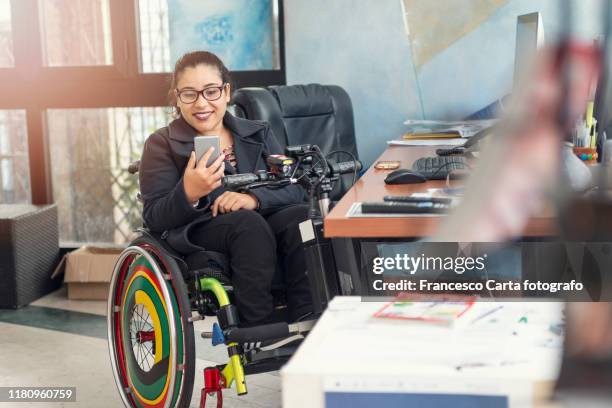 woman with disability working - differing abilities female business fotografías e imágenes de stock