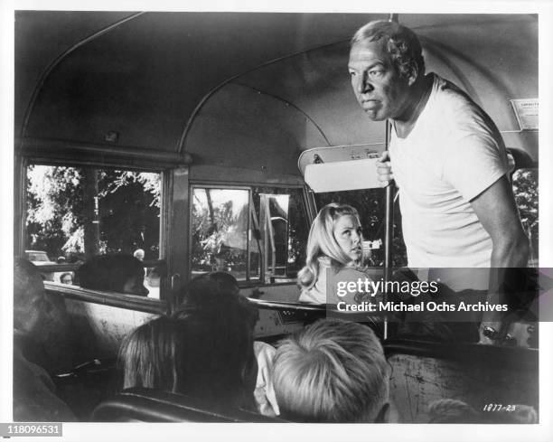 George Kennedy explodes on a bus full of children in a scene from the film 'Tick...Tick...Tick...', 1970.