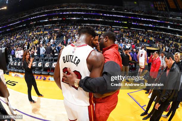 Jimmy Butler of the Miami Heat talks with Former NBA Player, Dwyane Wade after the game against the Los Angeles Lakers on November 8, 2019 at STAPLES...