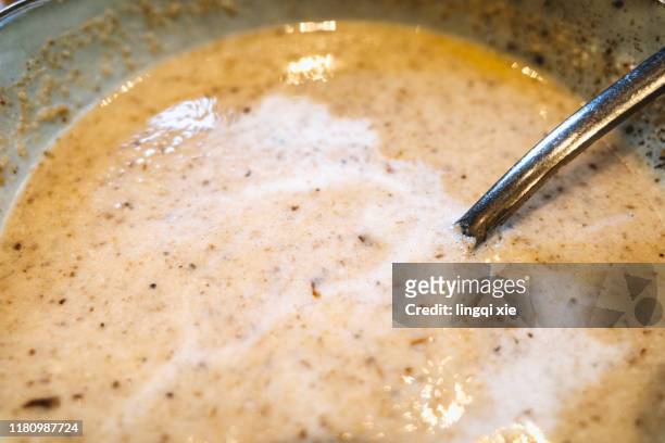 a bowl of mushroom soup - cremesuppe stock-fotos und bilder