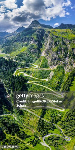 drone shot, winding road, silvretta high alpine road, montafon, vorarlberg, austria - montafon valley stock pictures, royalty-free photos & images