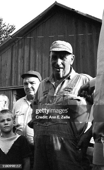 Men Attend A Farm Auction