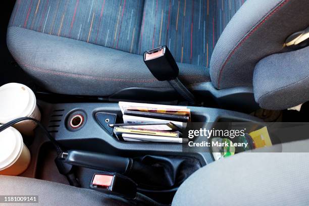 car interior with random cables and messy interior - messy car interior stock pictures, royalty-free photos & images