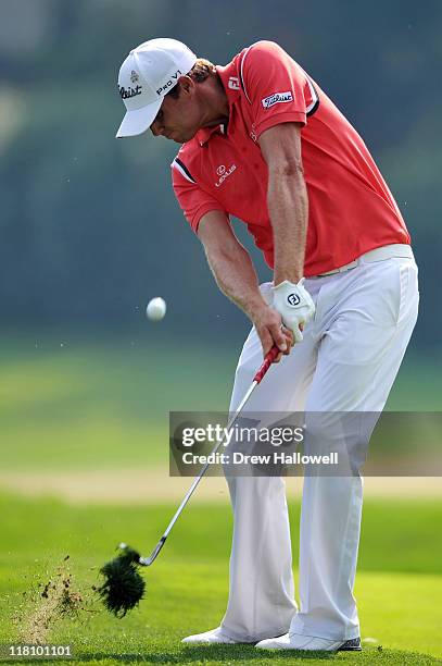 Nick Watney hits his second shot on the 18th hole during the final round of the AT&T National at Aronimink Golf Club on July 3, 2011 in Newtown...