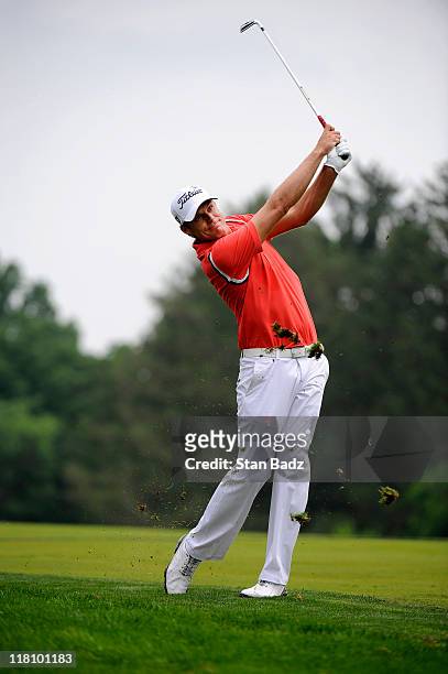 Nick Watney hits a shot from the fourth hole during the final round of the AT&T National at Aronimink Golf Club on July 3, 2011 in Newtown Square,...