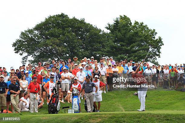 Nick Watney hits his tee shot on the eighth hole during the final round of the AT&T National at Aronimink Golf Club on July 3, 2011 in Newtown...