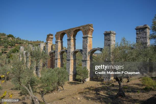 roman aqueduct, moria, mytilene, lesvos, greece - lesbos stockfoto's en -beelden