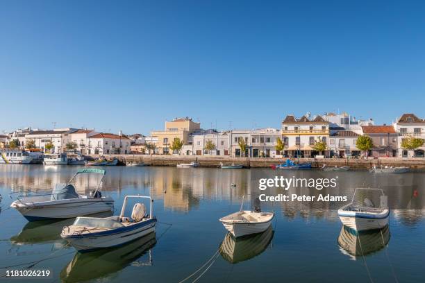 tavira, portugal - april 2019: fishing boats at tavira; eastern algave; portugal - faro city portugal foto e immagini stock