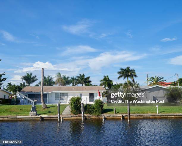 Residential waterway is seen on Friday, October 25, 2019 in Cape Coral, Florida. U.S. Rep. Francis Rooney, of Congressional District 19 in Lee and...