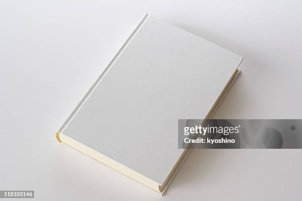 isolated shot of white blank book on white background - blank book cover stockfoto's en -beelden