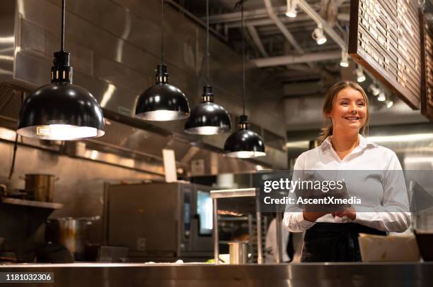 server adding a new order with a tablet - hotel manager stock pictures, royalty-free photos & images