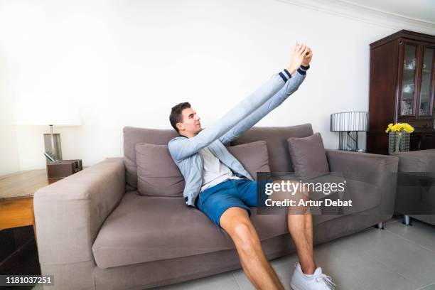 surreal selfie of guy with super stretched arms. - 長 ストックフォトと画像