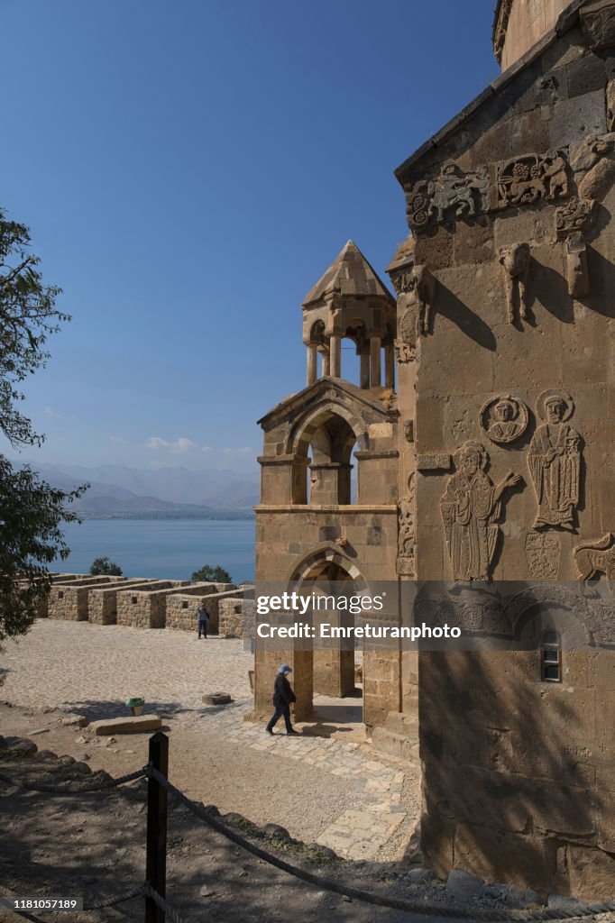 Tourists walking in the courtyard of Akdamar church,Van Lake.