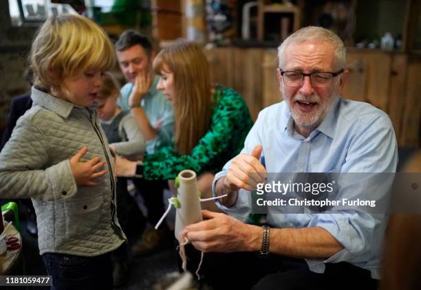 Labour leader Jeremy Corbyn laughs during a visit to the Scrap Creative Reuse Arts Project, Sunny Bank Mills, The Spinning Mill on November 9, 2019...