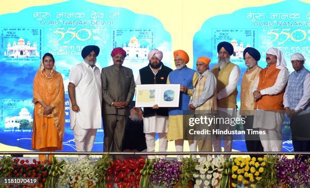 Prime Minister Narendra Modi along with Punjab Chief Minister Capt Amarinder Singh, SAD President Sukhbir Singh Badal and others launches a Postal...