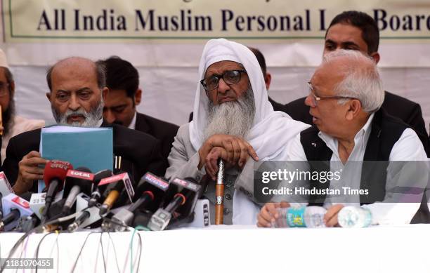 All India Muslim Personal Law Board members Zafaryab Jilani , Maulana Abdul Rahmani , and Kamal Farooqui address a press conference after the Supreme...