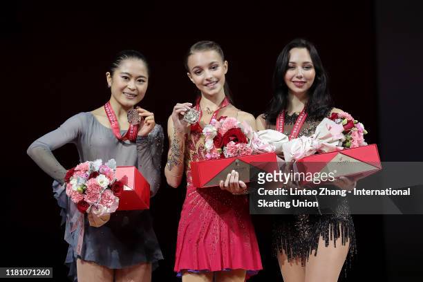 Silver medalist Satoko Miyahara of Japan,gold medalist Anna Shcherbakova of Russia and bronze medalist Elizaveta Tuktamysheva of Russia celebrates...