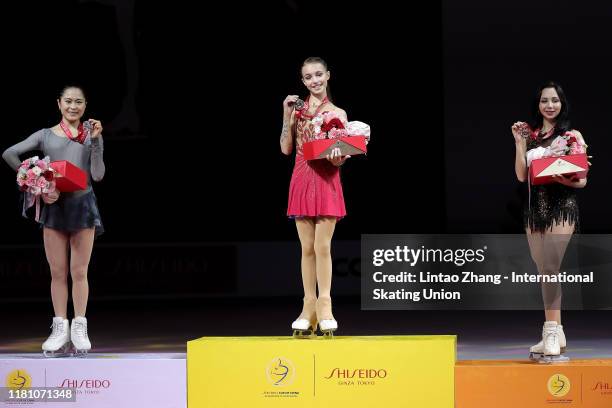 Silver medalist Satoko Miyahara of Japan,gold medalist Anna Shcherbakova of Russia and bronze medalist Elizaveta Tuktamysheva of Russia celebrates...