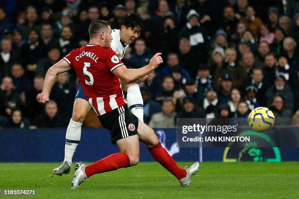 Sheffield United's English defender Jack O'Connell vies with Tottenham Hotspur's South Korean striker Son Heung-Min during the English Premier League...