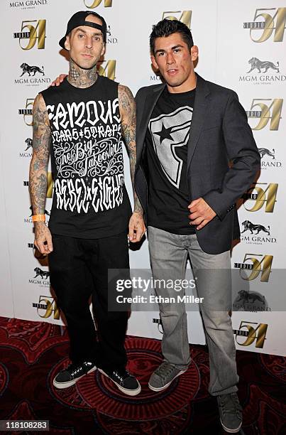 Drummer Travis Barker and mixed martial artist Dominick Cruz arrive at a post-fight party for UFC 132 at Studio 54 inside the MGM Grand Hotel/Casino...