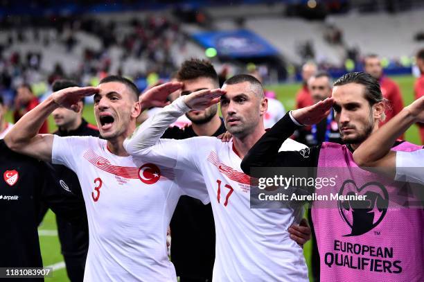Burak Yilmaz and Merih Demiral of Turkey celebrates with their fans making a military salute after the UEFA Euro 2020 qualifier between France and...