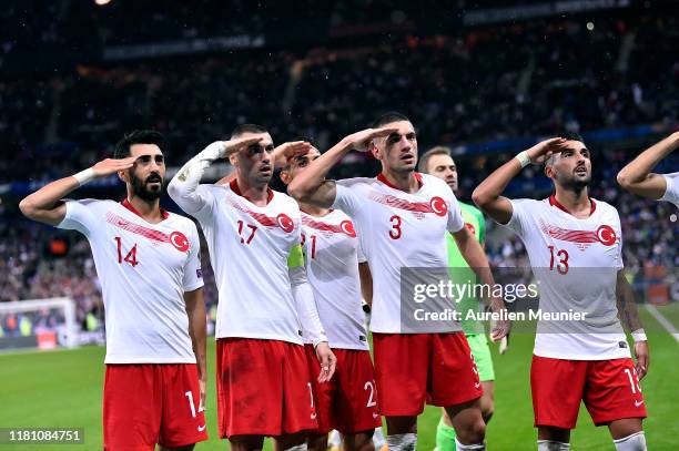 Mahmut Tekdemir, Burak Yilmaz, Merih Demiral and Umut Meras react by making a military salute after Kaan Ayhan goal during the UEFA Euro 2020...