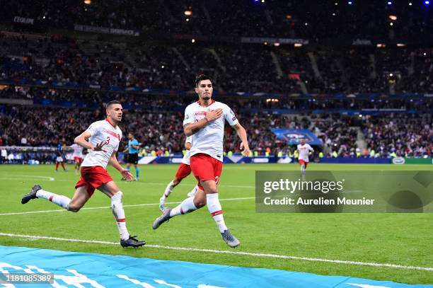 Kaan Ayhan of Turkey reacts after scoring during the UEFA Euro 2020 qualifier between France and Turkey on October 14, 2019 in Saint-Denis, France.