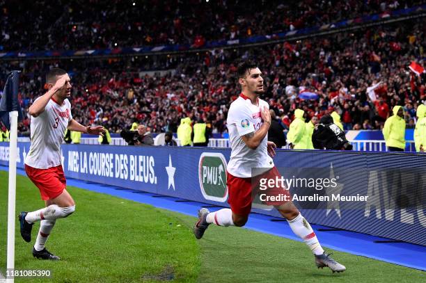 Kaan Ayhan of Turkey reacts after scoring during the UEFA Euro 2020 qualifier between France and Turkey on October 14, 2019 in Saint-Denis, France.