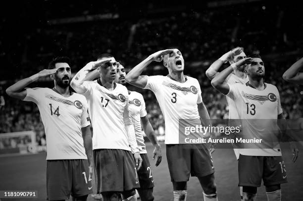 Mahmut Tekdemir, Burak Yilmaz, Merih Demiral and Umut Meras react by making a military salute after Kaan Ayhan goal during the UEFA Euro 2020...