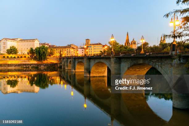 landscape of logroño with the ebro river at dusk - logrono stock pictures, royalty-free photos & images
