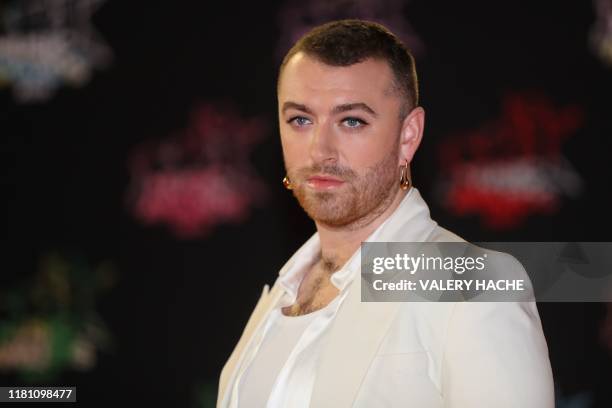 British singer Sam Smith poses on the red carpet as he arrives to attend the 21st NRJ Music Awards ceremony at the Palais des Festivals in Cannes,...