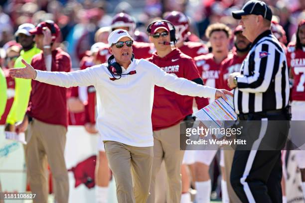 Head Coach Chad Morris of the Arkansas Razorbacks yells at the official during the second half of a game against the Western Kentucky Hilltoppers at...