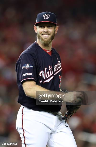 Stephen Strasburg of the Washington Nationals reacts to the umpire's call in the seventh inning of game three of the National League Championship...
