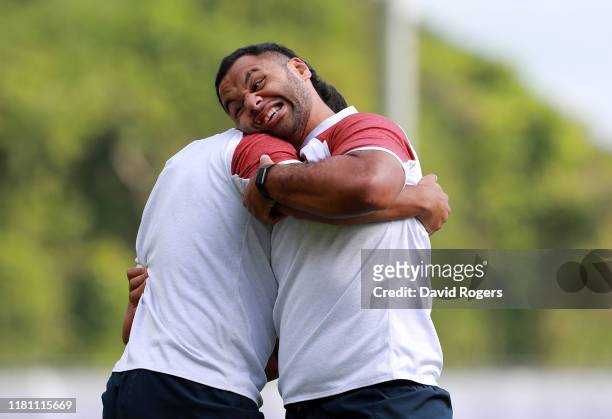 Billy Vunipola grapples with team mate Lewis Ludlam during the England training session held Jissouji multi purpose ground on October 15, 2019 in...