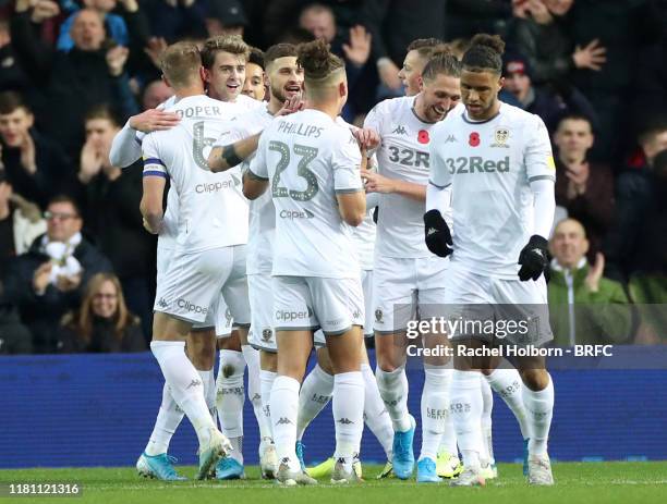 Jack Harrison of Leeds United celebrates his sides second goal with his fellow team mates during the Sky Bet Championship match between Leeds United...